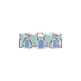 The Coïncidence Ring in Palm Beach features alternating round turquoise and blue lacquered ceramic arch motifs in 18k white gold, highlighted with sparkling brilliant diamonds arranged around the band.