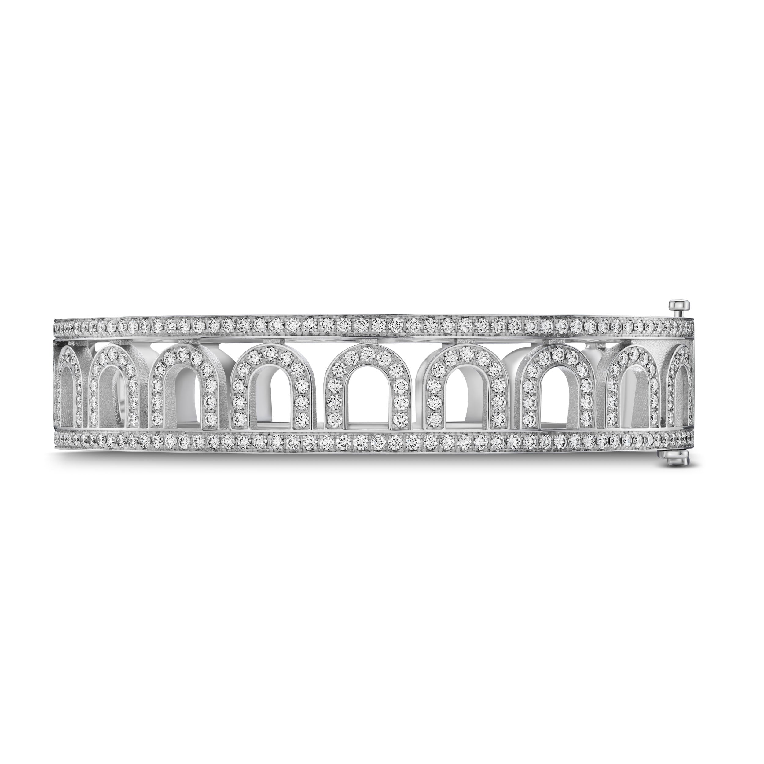 The L'Arc Treille Bangle GM, crafted in 18k white gold with Palais Diamonds and a repeating arch pattern, is an elegant stackable bracelet that dazzles against a white background.