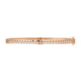 The L’Arc de DAVIDOR Bangle Mini, 18k Rose Gold with Satin Finish and Brilliant Diamonds, showcases repeating arch motifs set with diamonds, shown from the side on a white background.