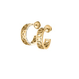 The L’Arc Treille Creole Earring PM Mini, 18k Yellow Gold features polished gold hoops with cut-out letters in a repeating pattern, displayed against a white background.