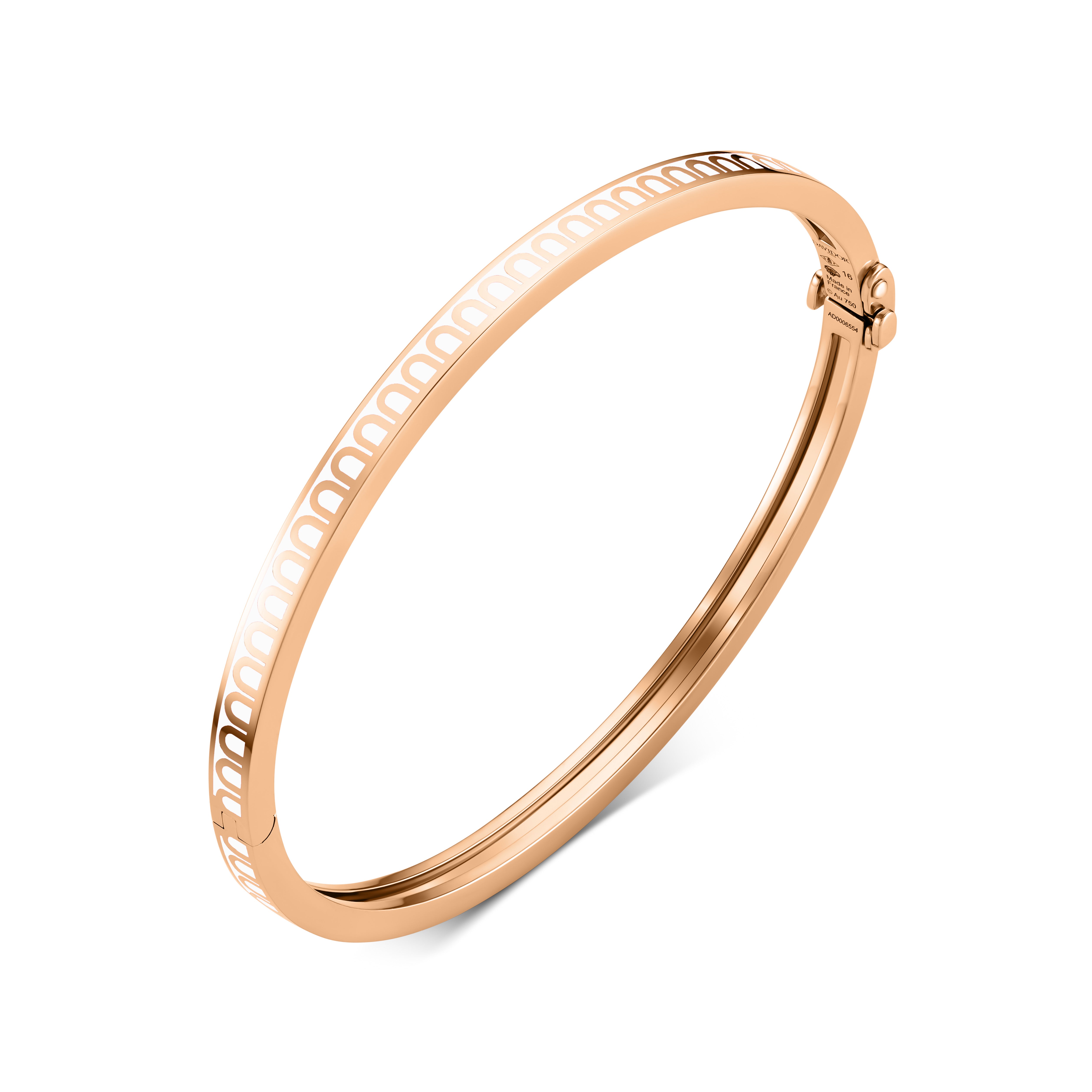 Introducing the L’Arc de DAVIDOR Bangle Mini, an exquisite 18k rose gold bracelet accented with lacquered ceramic. Inspired by the iconic DAVIDOR Arch motif, this stackable bangle features a repeating oval design along its edge and is secured with a discreet hinge clasp. Elegantly presented against a white background, it exemplifies timeless sophistication.