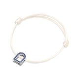 L'Arc Voyage Charm MM, 18k White Gold with Galerie Blue Sapphires on Silk Cord - DAVIDOR