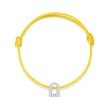 Introducing the L'Arc Voyage Charm PM, a minimalist bracelet that showcases a vibrant yellow silk cord and an elegant 18k white gold charm designed in an arch shape, adorned with sparkling Galerie diamonds. Inspired by the sophistication of a Paris Atelier, its adjustable knots offer a customizable fit for any wrist.