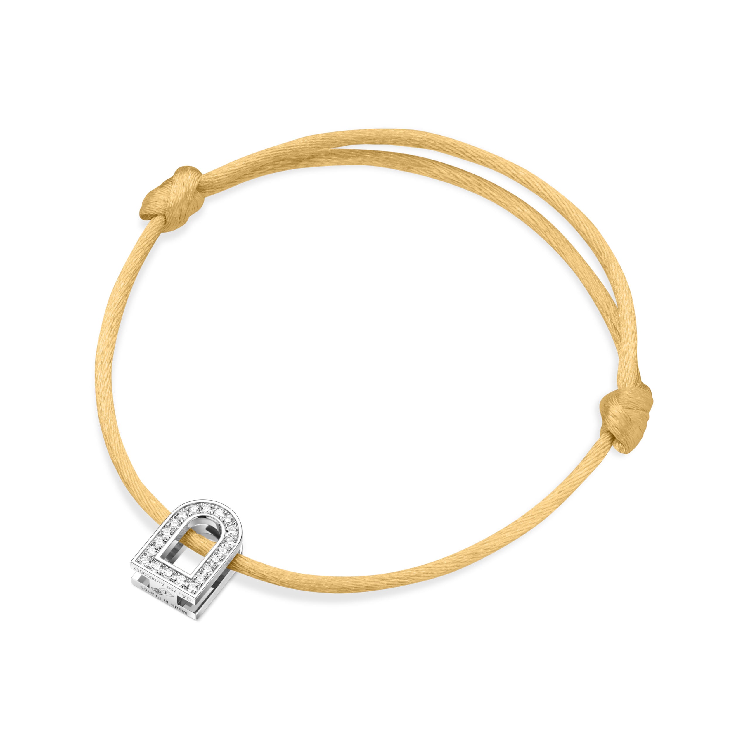 The L'Arc Voyage Charm PM bracelet from a Paris Atelier showcases an exquisite design with its 18k white gold lock charm adorned with Galerie diamonds. The silk cord in a delicate yellow hue is elegantly tied with adjustable knots, making it both simple and sophisticated.