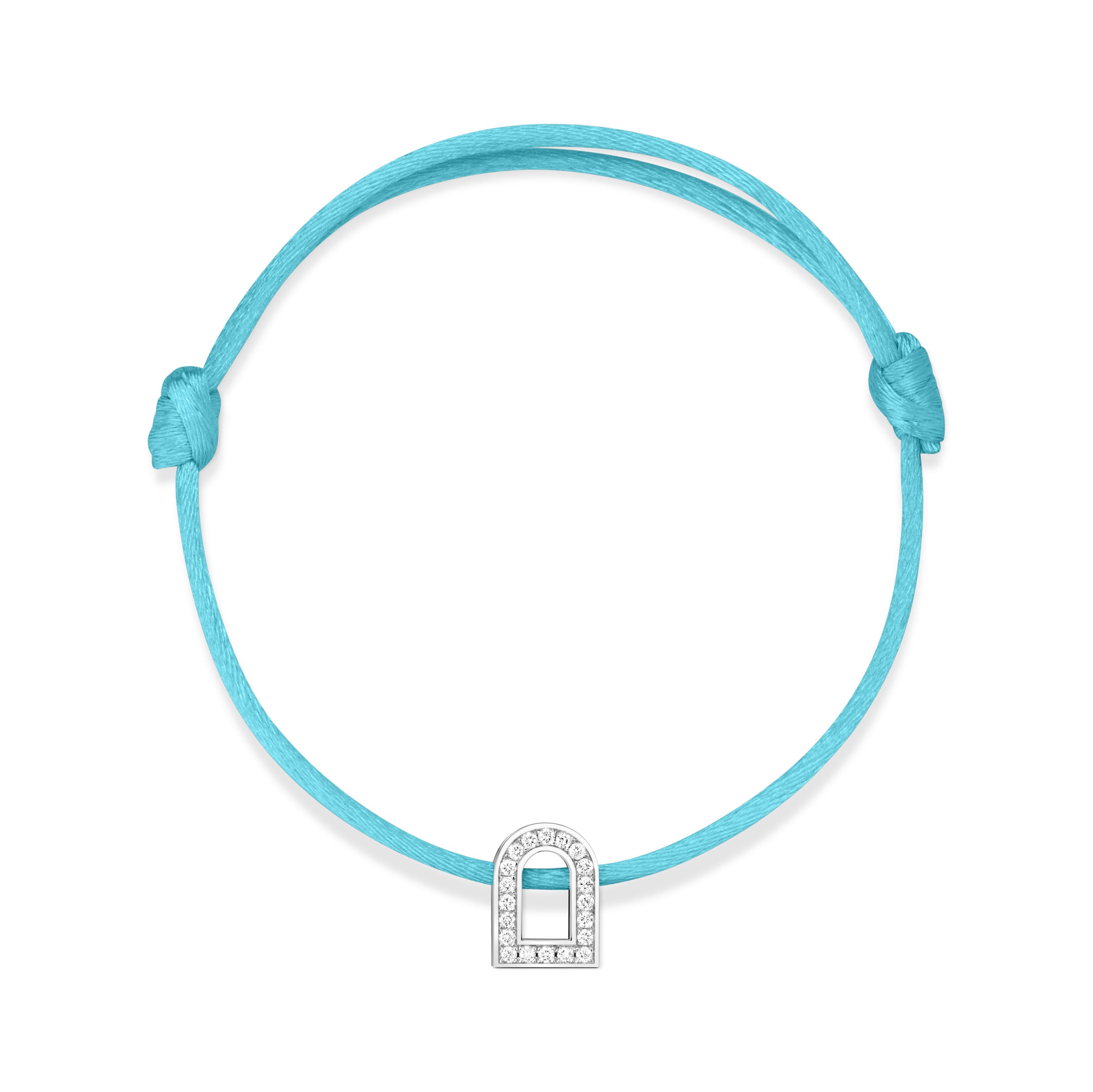 The L'Arc Voyage Charm PM bracelet showcases a turquoise silk cord with an adjustable knot design, featuring a striking 18k white gold padlock charm adorned with Galerie diamonds. Crafted with precision at the Paris Atelier, this charm is elegantly centered on the simple yet graceful cord.