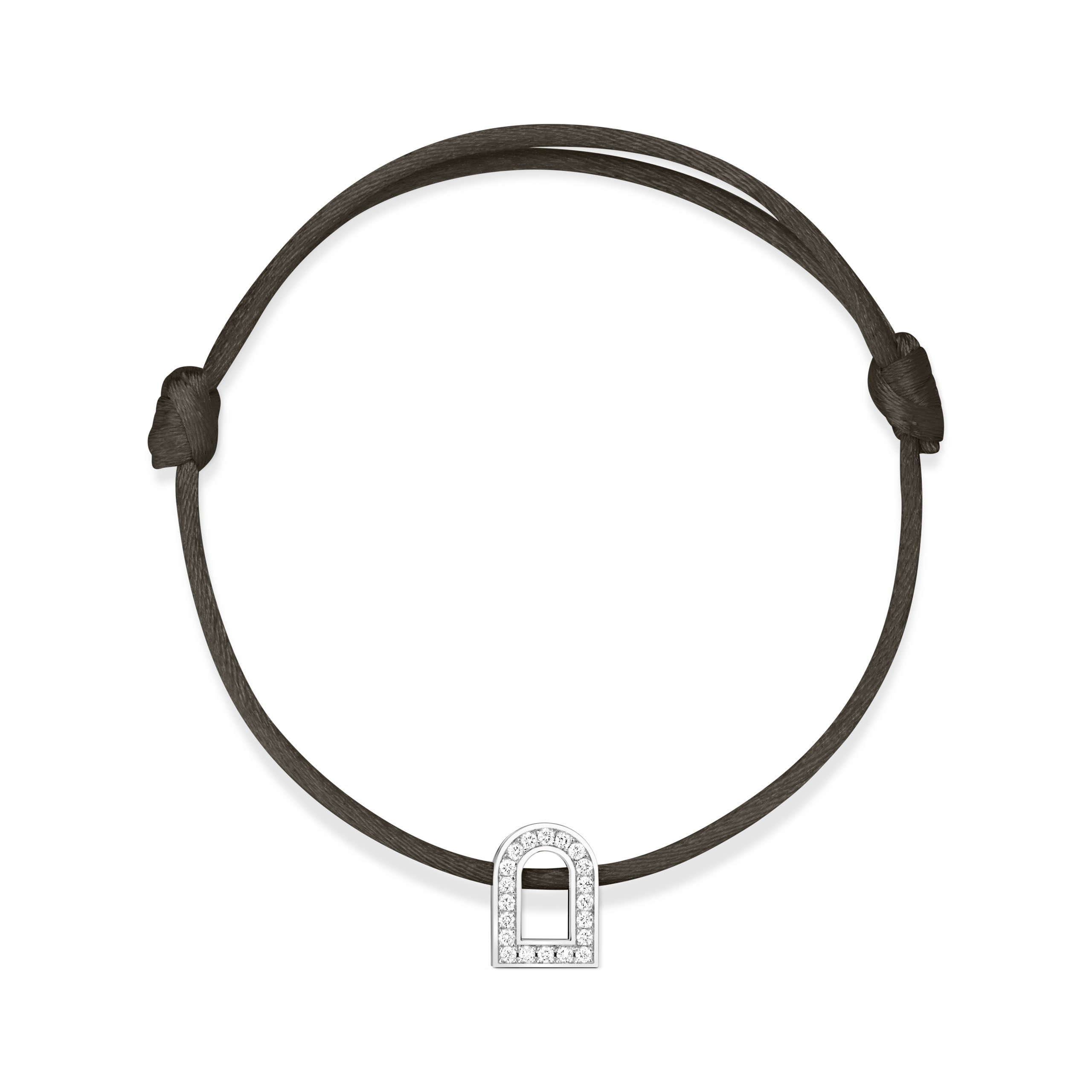 A silk cord bracelet featuring the L'Arc Voyage Charm PM, crafted from 18k white gold and embellished with Galerie Diamonds. This subtly curved charm, echoing a Paris Atelier design, is symmetrically suspended at the center of the bracelet.