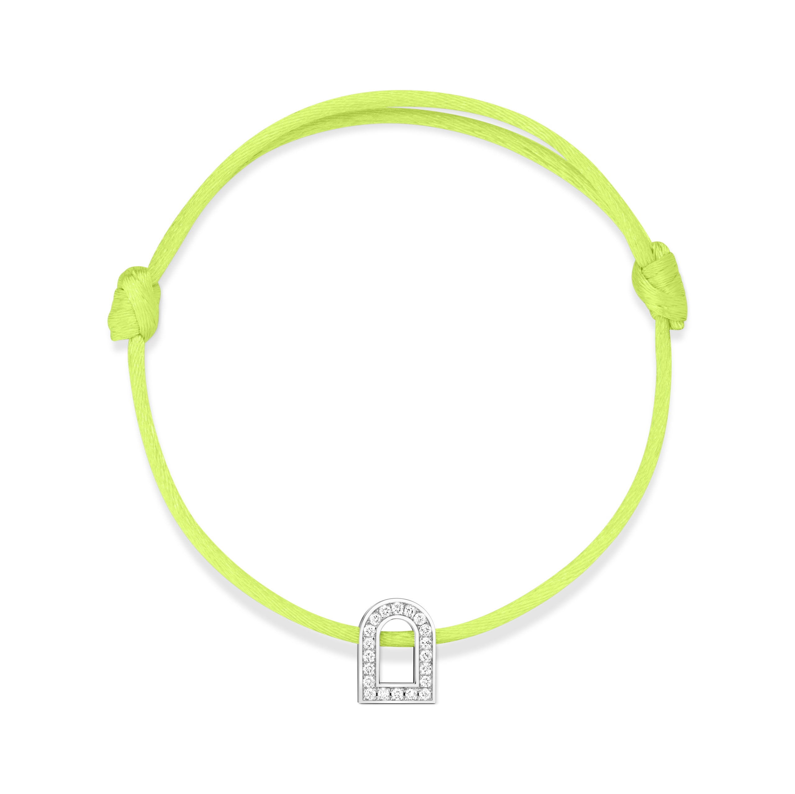 The L'Arc Voyage Charm PM bracelet, featuring an adjustable neon green silk cord and a small arch-shaped charm crafted in 18k white gold adorned with Galerie diamonds, is beautifully presented against a pristine white background. This exquisite piece is from the Paris Atelier collection.